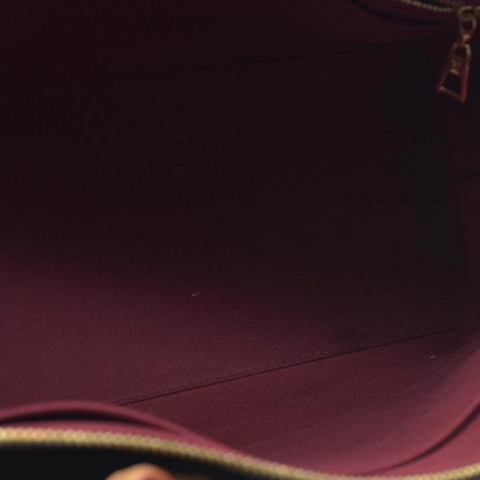 $3150 Louis Vuitton  Monogram Grand Palais
