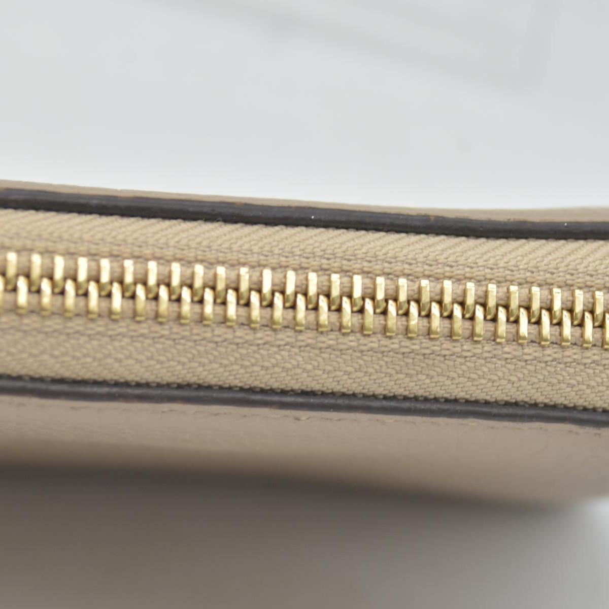 $1410 2019 Louis Vuitton Taurillon Comete Wallet Galet CONSIGNMENT MI1119