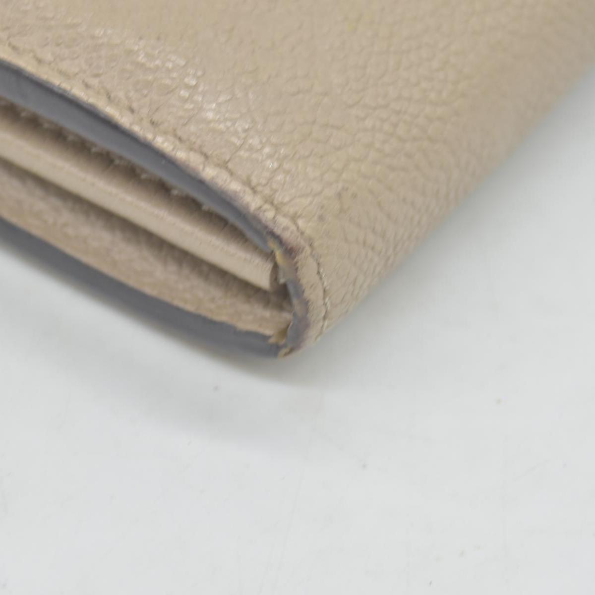 $1060 LOUIS VUITTON Portefeuille Sarah Monogram Empreinte Tourterelle Wallet