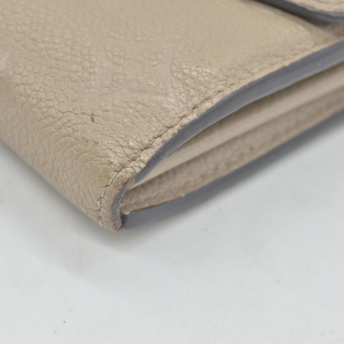 $1060 LOUIS VUITTON Portefeuille Sarah Monogram Empreinte Tourterelle Wallet