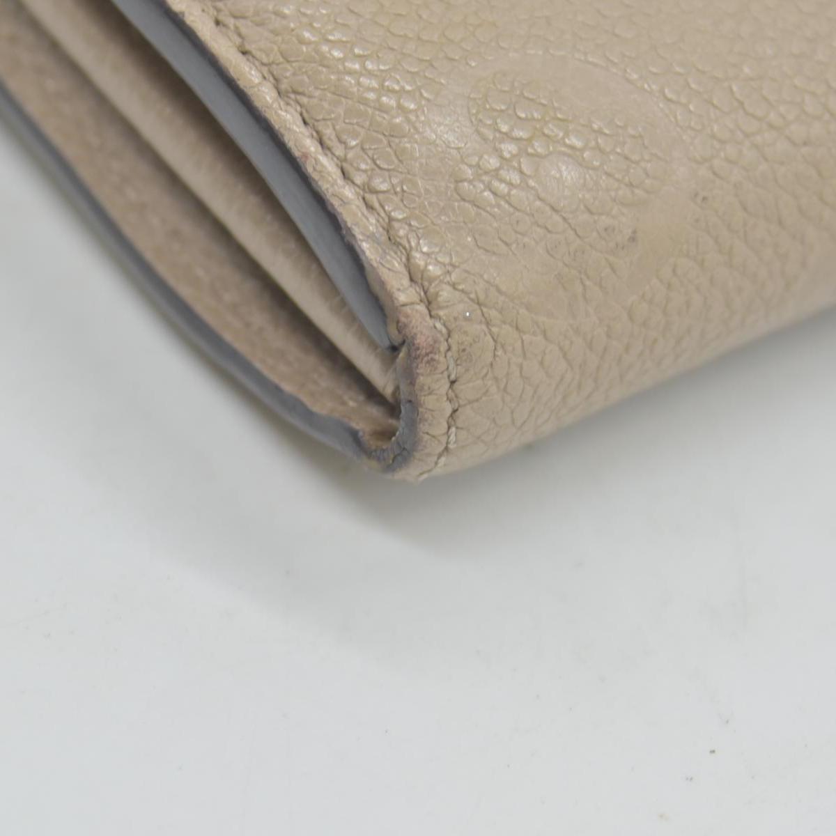 $1060 LOUIS VUITTON Portefeuille Sarah Monogram Empreinte Tourterelle Wallet