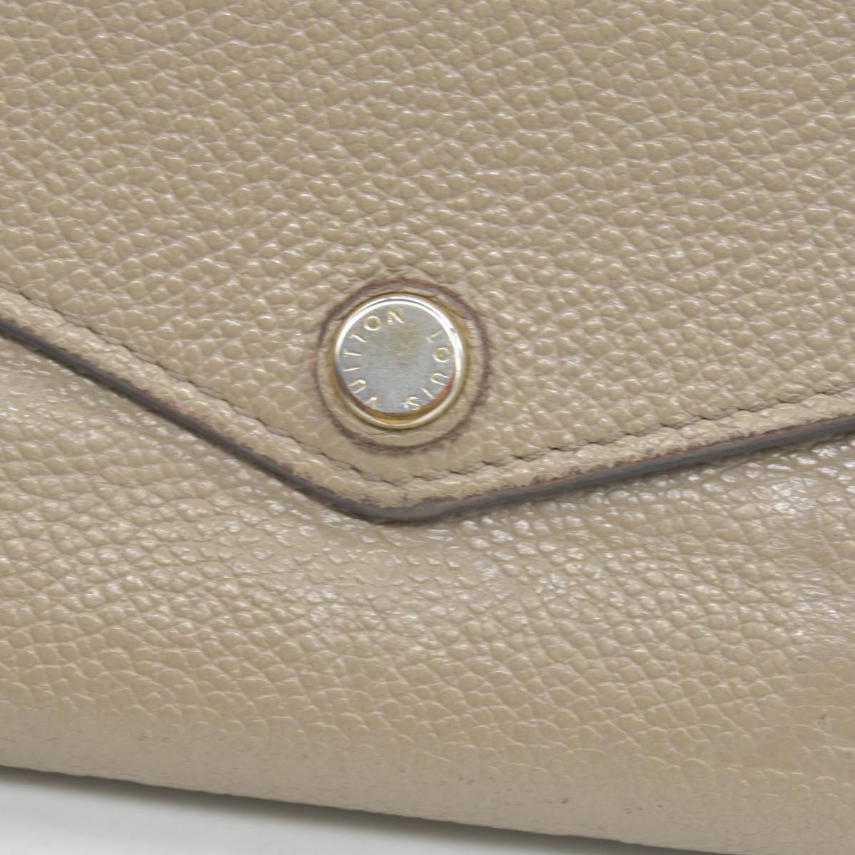 $1060 LOUIS VUITTON Portefeuille Sarah Monogram Empreinte Tourterelle Wallet