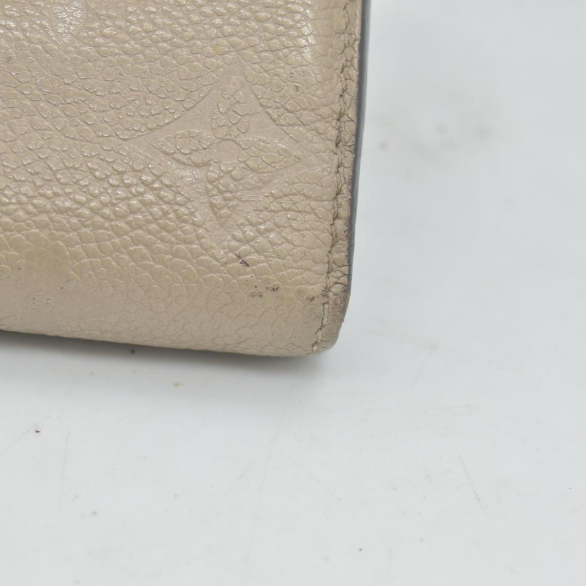 $1060 LOUIS VUITTON Portefeuille Sarah Monogram Empreinte Tourterelle Wallet