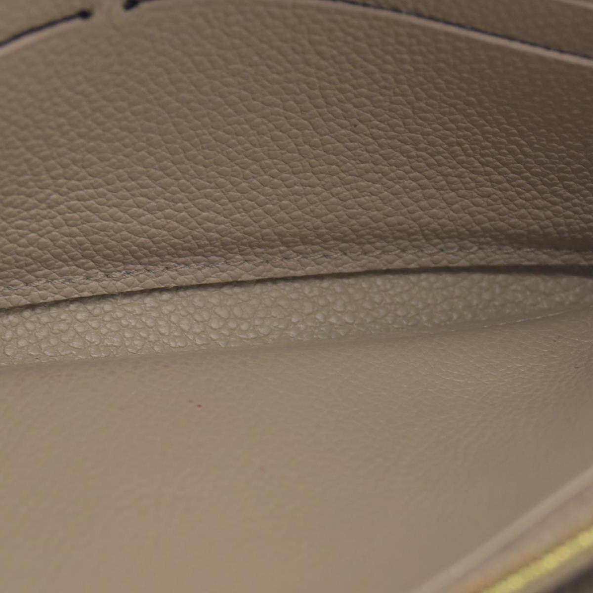 $1060 LOUIS VUITTON Portefeuille Sarah Monogram Empreinte Tourterelle Wallet