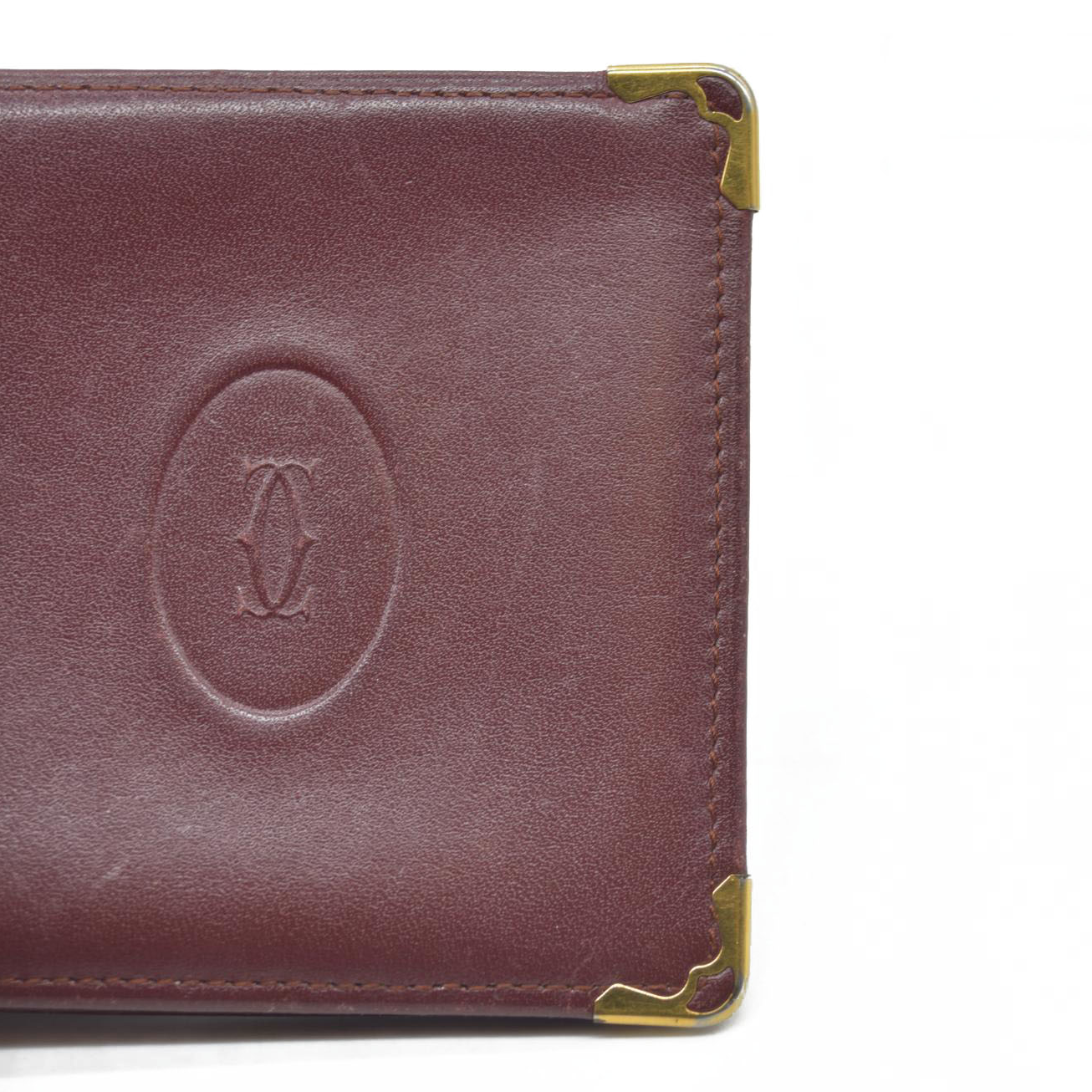 $580 Must de Cartier Leather Bifold Wallet Bordeaux