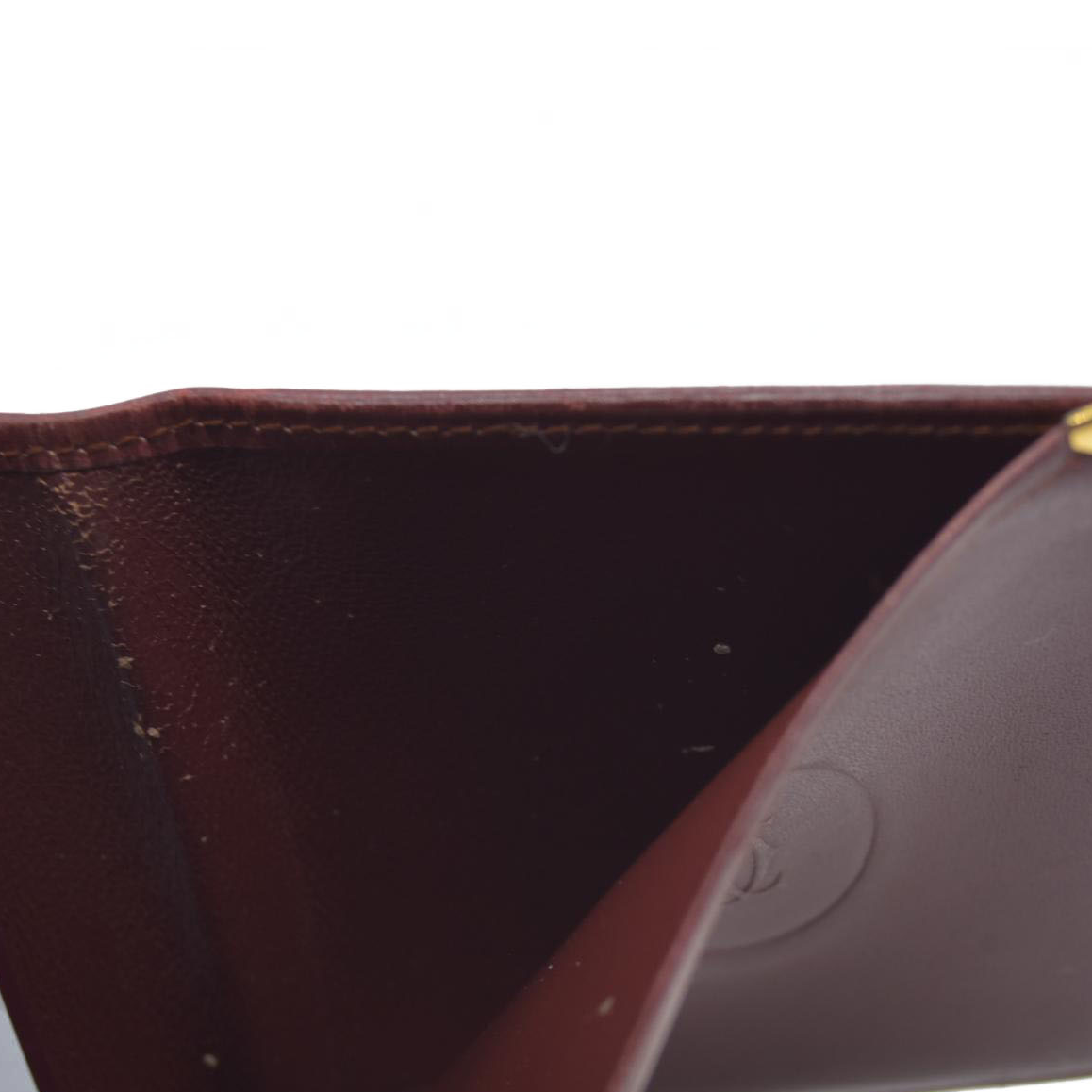 $580 Must de Cartier Leather Bifold Wallet Bordeaux