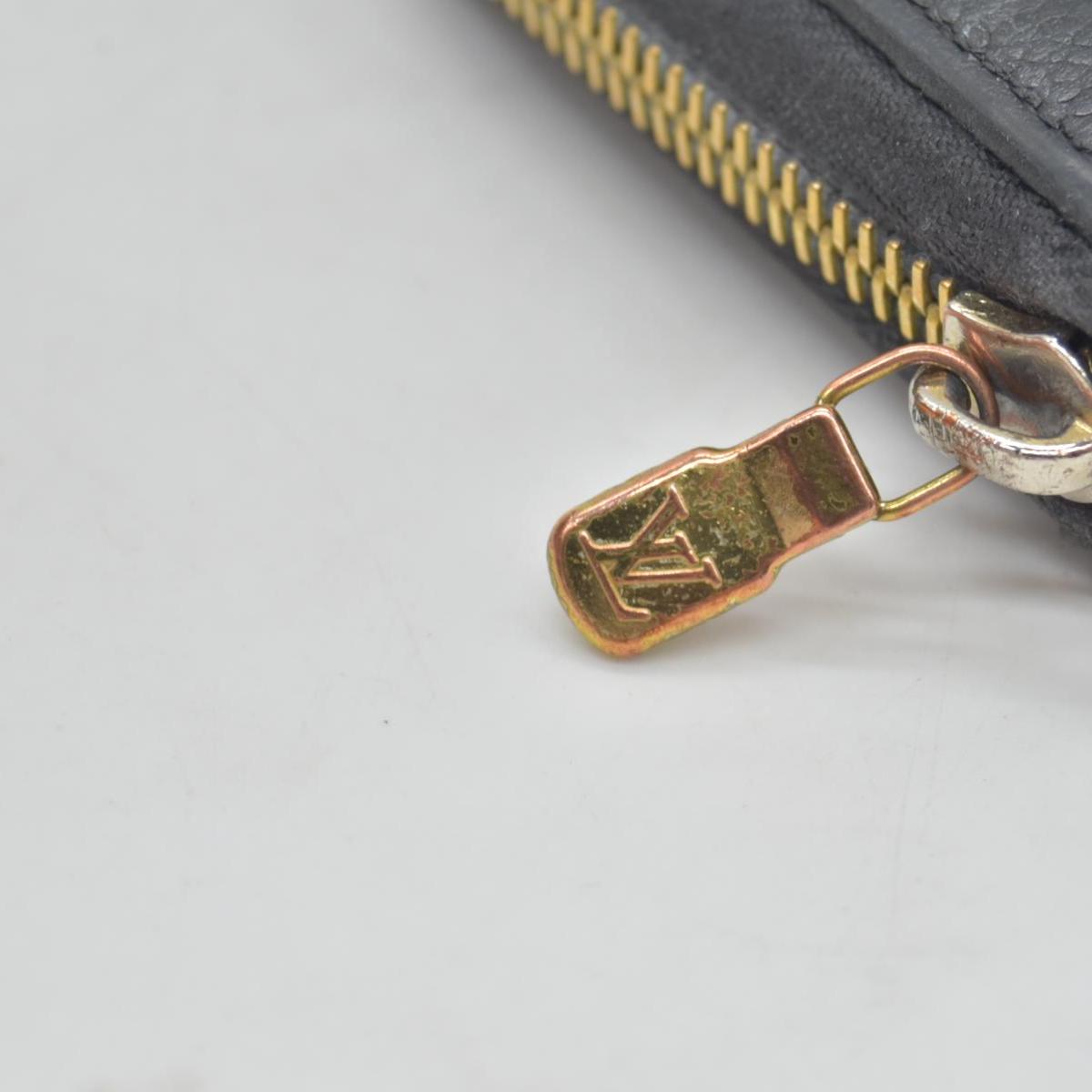 $1170 Louis Vuitton Monogram Empreinte Leather Zippy Long Wallet TN0155
