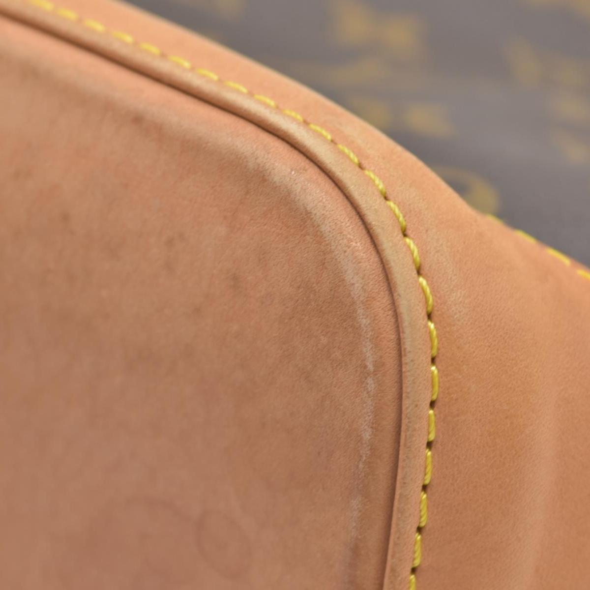 $1060 2006 Louis Vuitton Monogram Lockit PM FL0076
