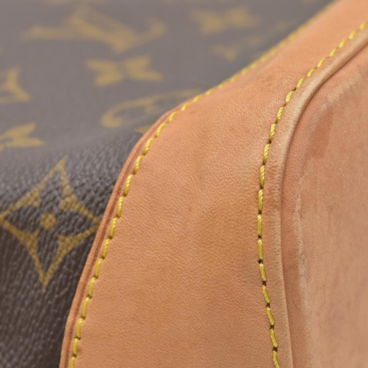 $1060 2006 Louis Vuitton Monogram Lockit PM FL0076
