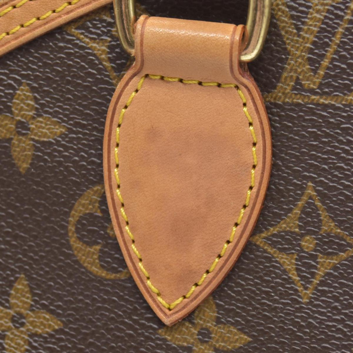 $1060 2006 Louis Vuitton Monogram Lockit PM FL0076