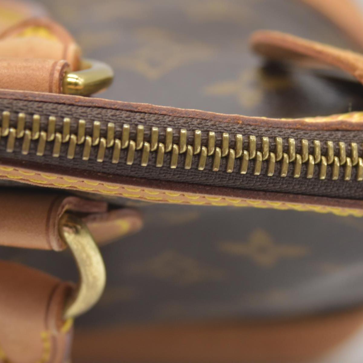 $1060 2006 Louis Vuitton Monogram Lockit PM FL0076