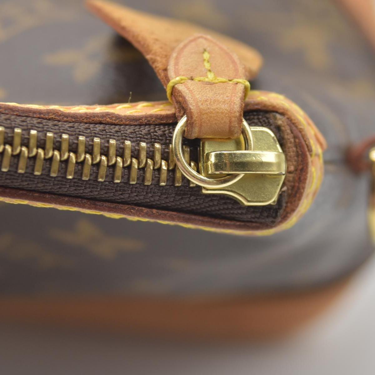 $1060 2006 Louis Vuitton Monogram Lockit PM FL0076