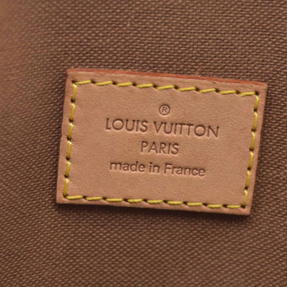 $1060 2006 Louis Vuitton Monogram Lockit PM FL0076
