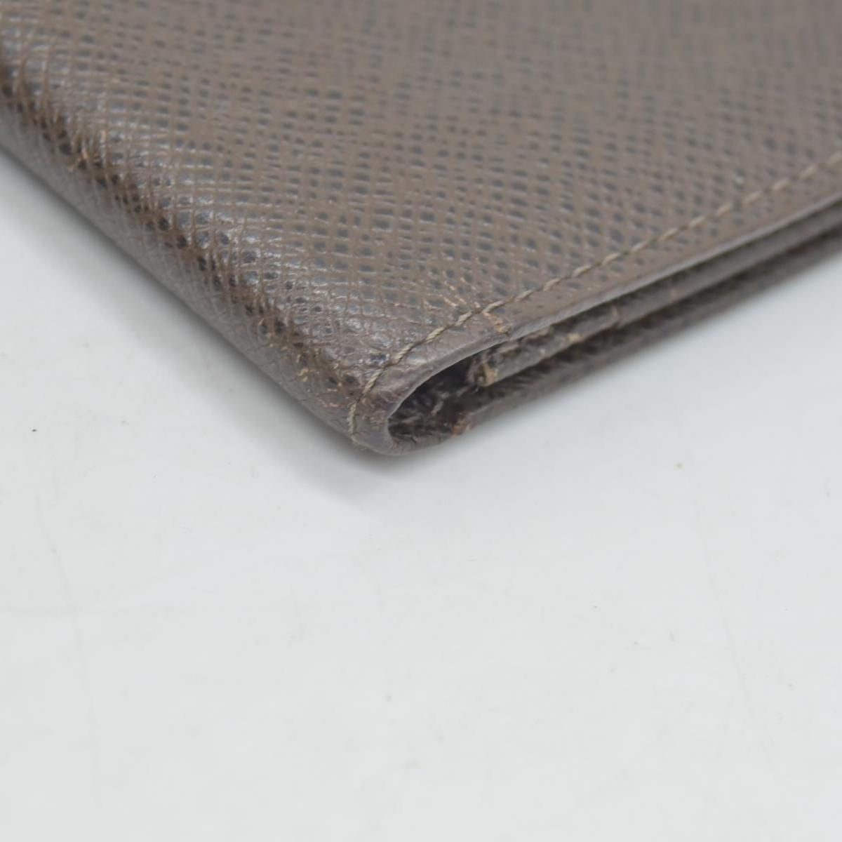 $835 Louis Vuitton Taiga Brown Leather Bifold Wallet CONSIGNMENT