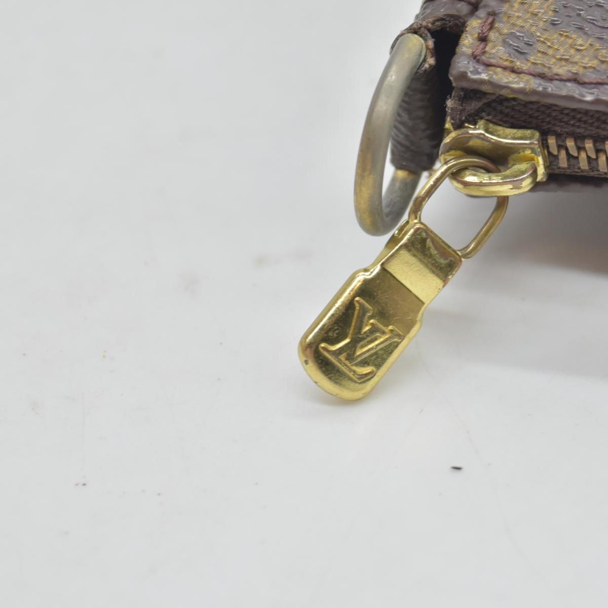 $1290 1999 Louis Vuitton Monogram Pochette Accessories AR0999