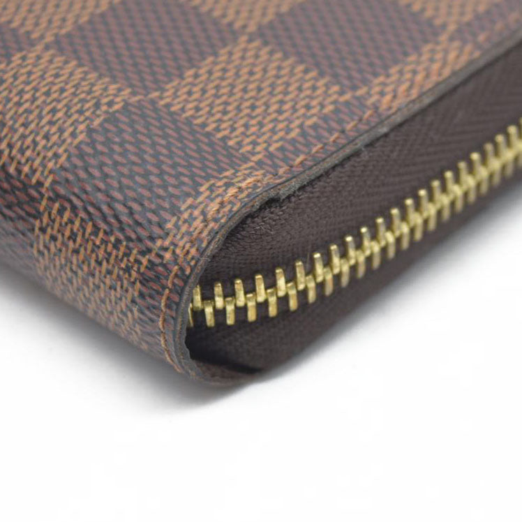 $915 2021 Louis Vuitton  Damier Ebene Zippy Wallet MI0231