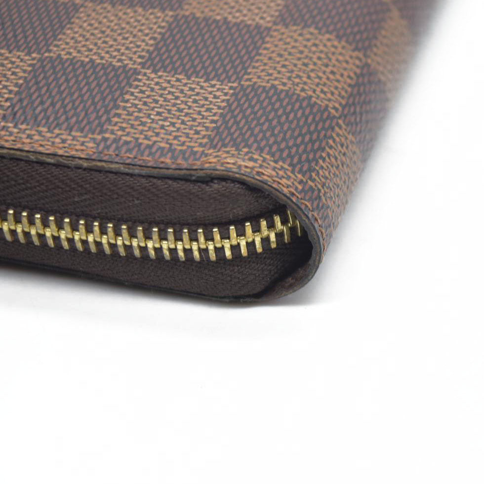 $915 2021 Louis Vuitton  Damier Ebene Zippy Wallet MI0231