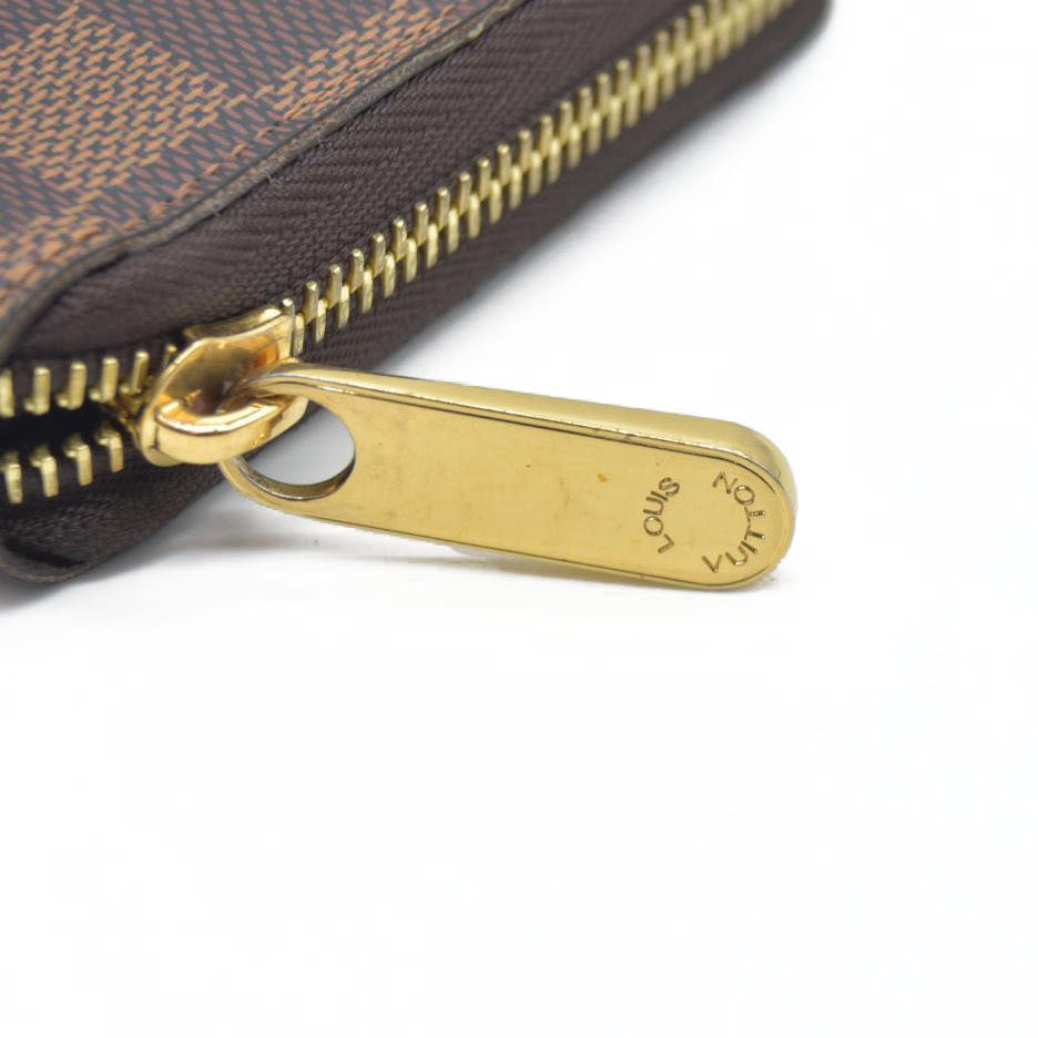 $915 2021 Louis Vuitton  Damier Ebene Zippy Wallet MI0231