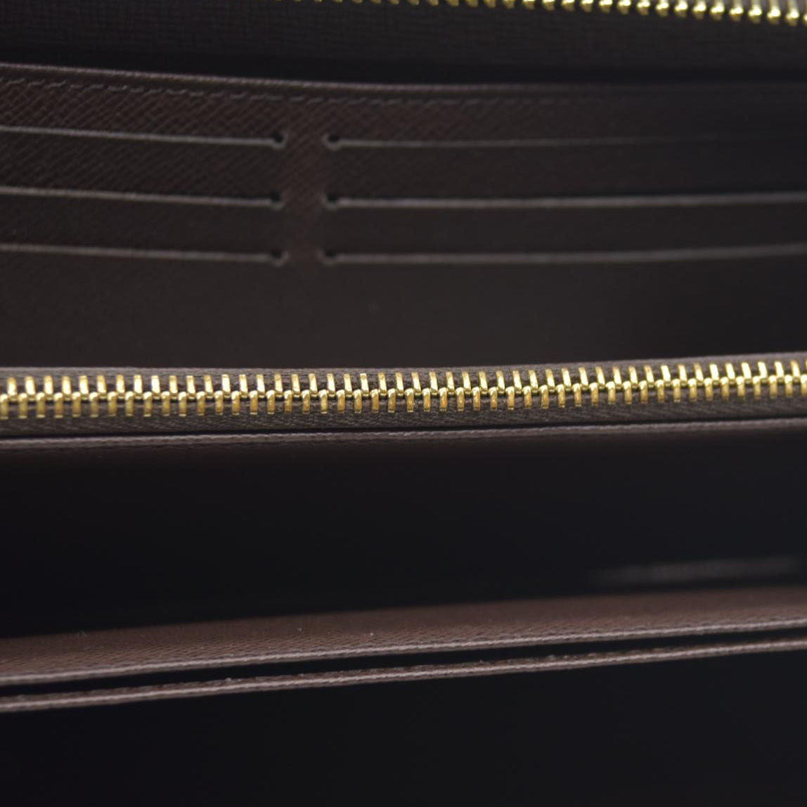 $915 2021 Louis Vuitton  Damier Ebene Zippy Wallet MI0231