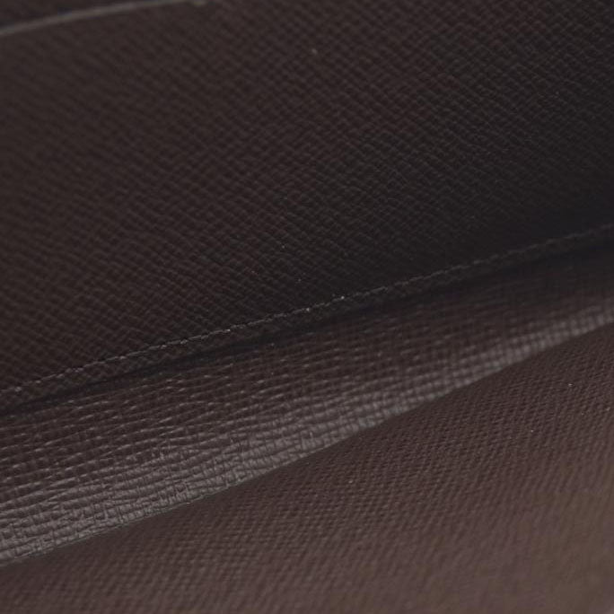 $915 2021 Louis Vuitton  Damier Ebene Zippy Wallet MI0231