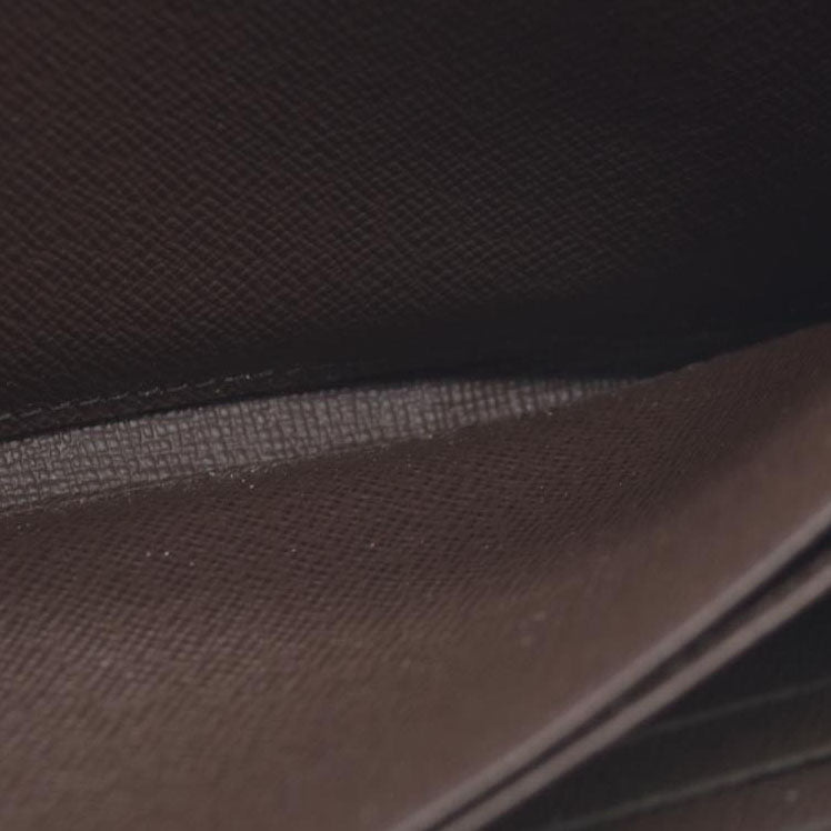 $915 2021 Louis Vuitton  Damier Ebene Zippy Wallet MI0231