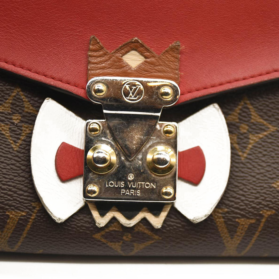 LOUIS VUITTON Monogram Tribal Mask Chain Wallet Rouge
