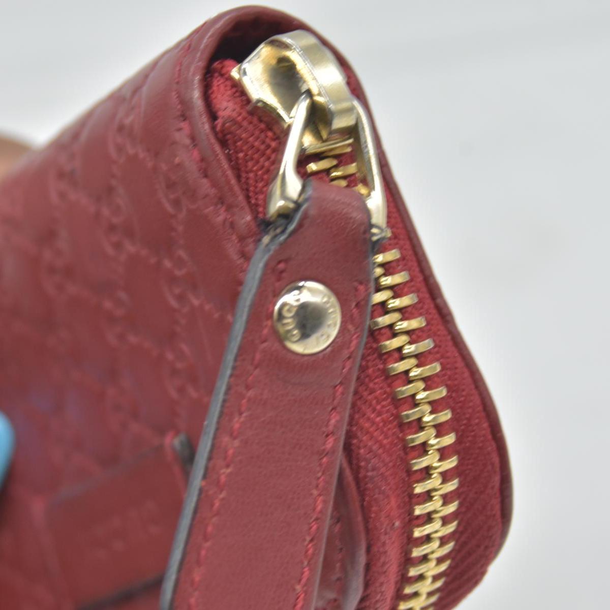 Gucci Microguccissima Zip Around Key Case Red CONSIGNMENT