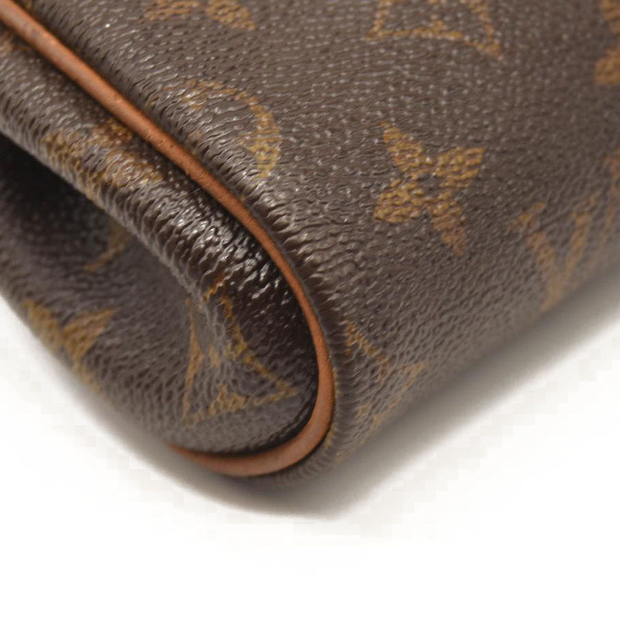 LOUIS VUITTON Monogram Eva Clutch