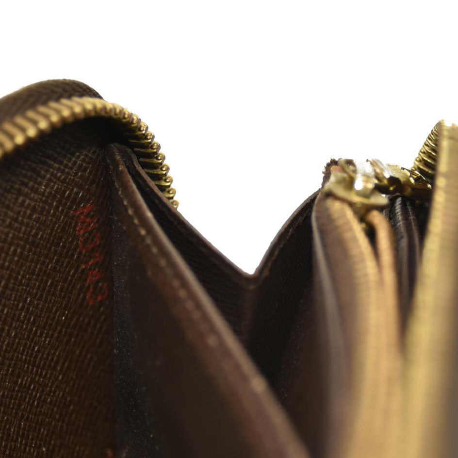 Louis Vuitton  Damier Ebene Zippy Wallet MI3143