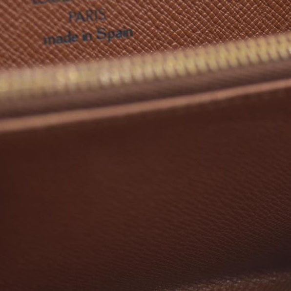 AUCTION $915 Louis Vuitton Monogram Porte Monnaie Zippy Long Wallet Brown CA0958