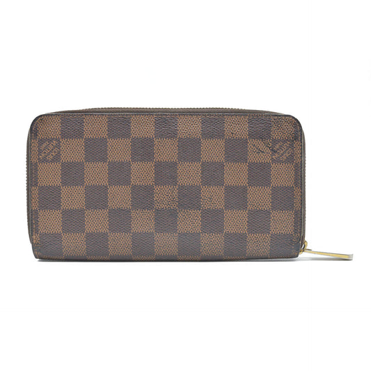 AUCTION $915 Louis Vuitton Damier Ebene Zippy Wallet CA2136