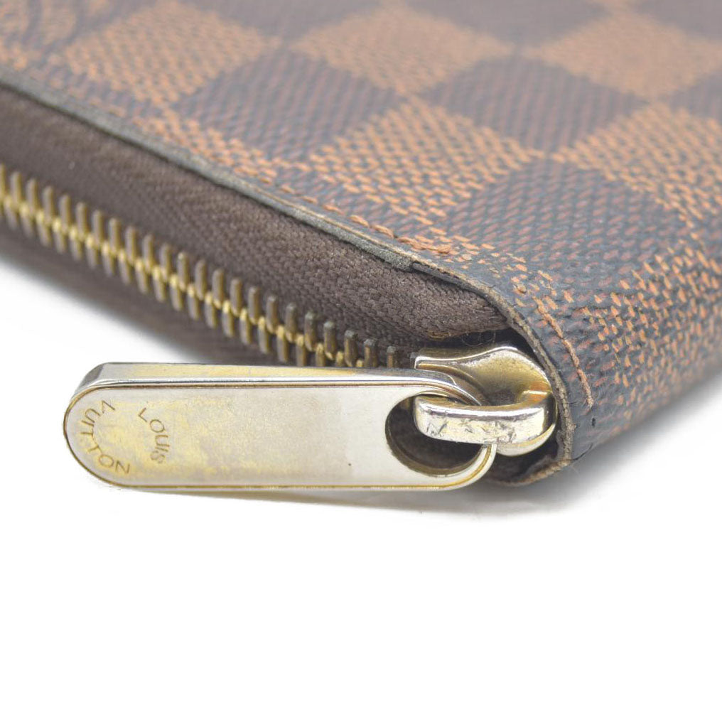 AUCTION $915 Louis Vuitton Damier Ebene Zippy Wallet CA2136
