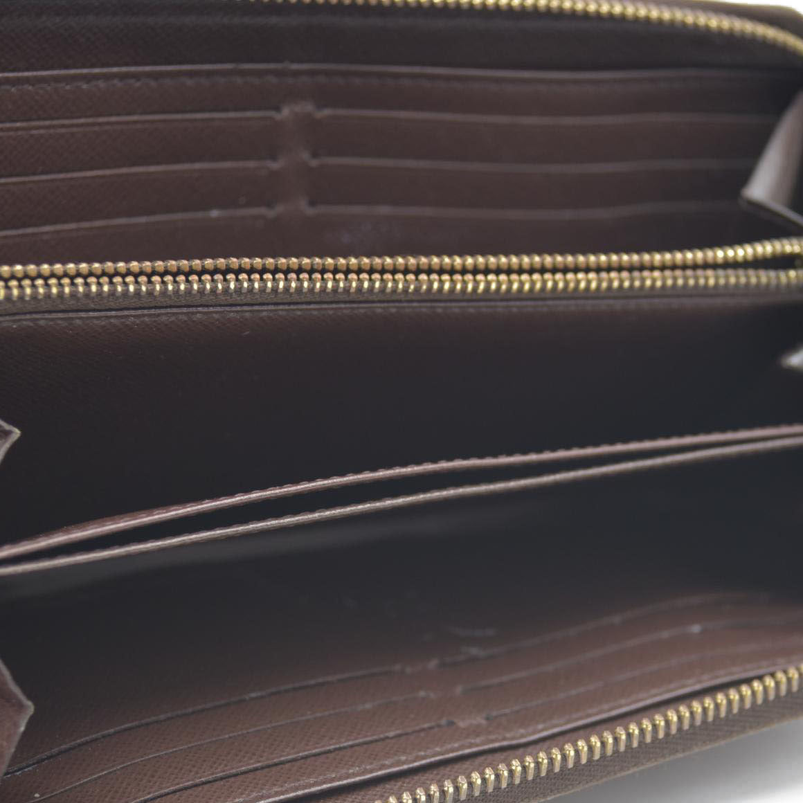 AUCTION $915 Louis Vuitton Damier Ebene Zippy Wallet CA2136