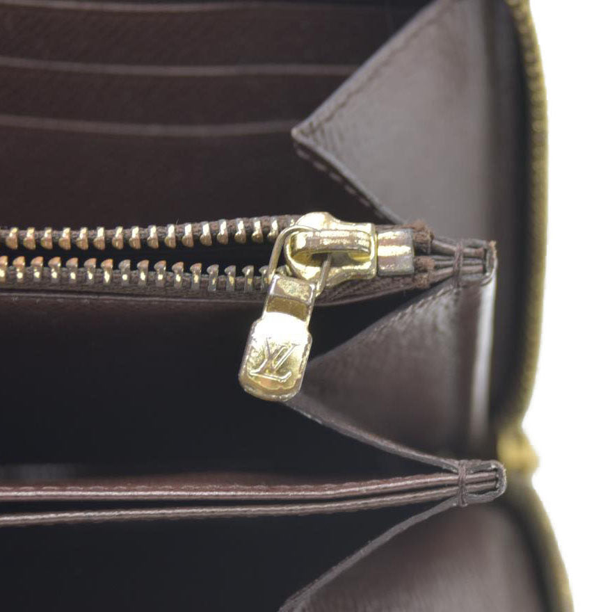 AUCTION $915 Louis Vuitton Damier Ebene Zippy Wallet CA2136