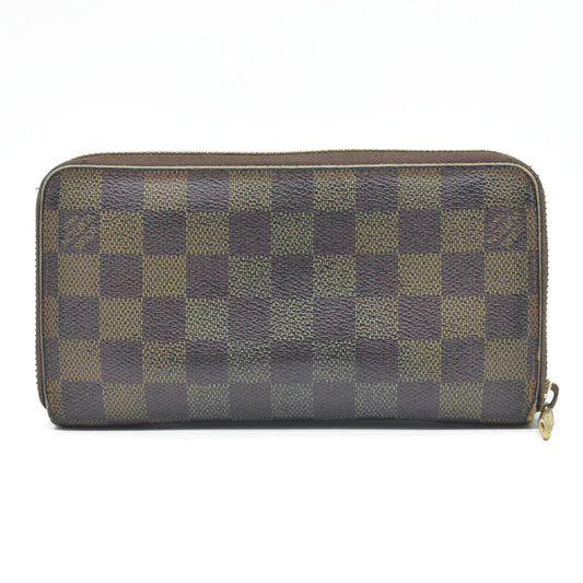 AUCTION $915 Louis Vuitton Damier Ebene Zippy Wallet VI0097