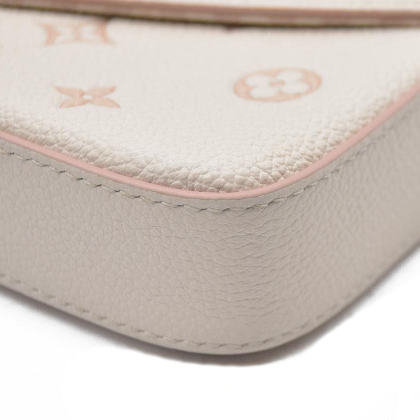 $1990 Louis Vuitton House's signature Monogram Pochette Félicie Bicolor Eden