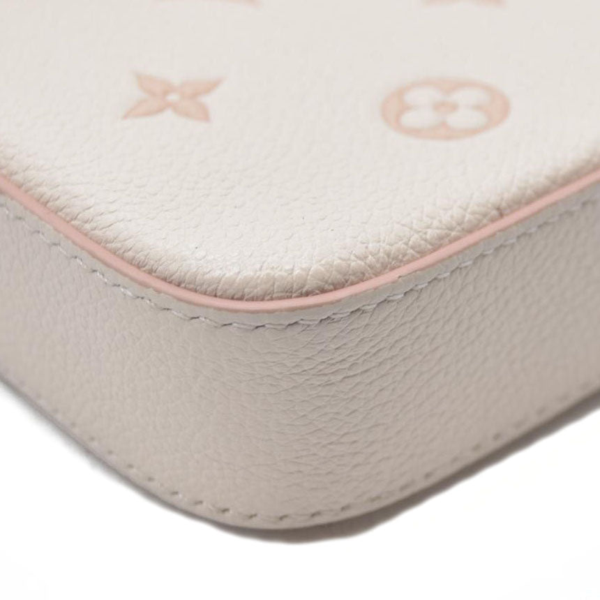 $1990 Louis Vuitton House's signature Monogram Pochette Félicie Bicolor Eden