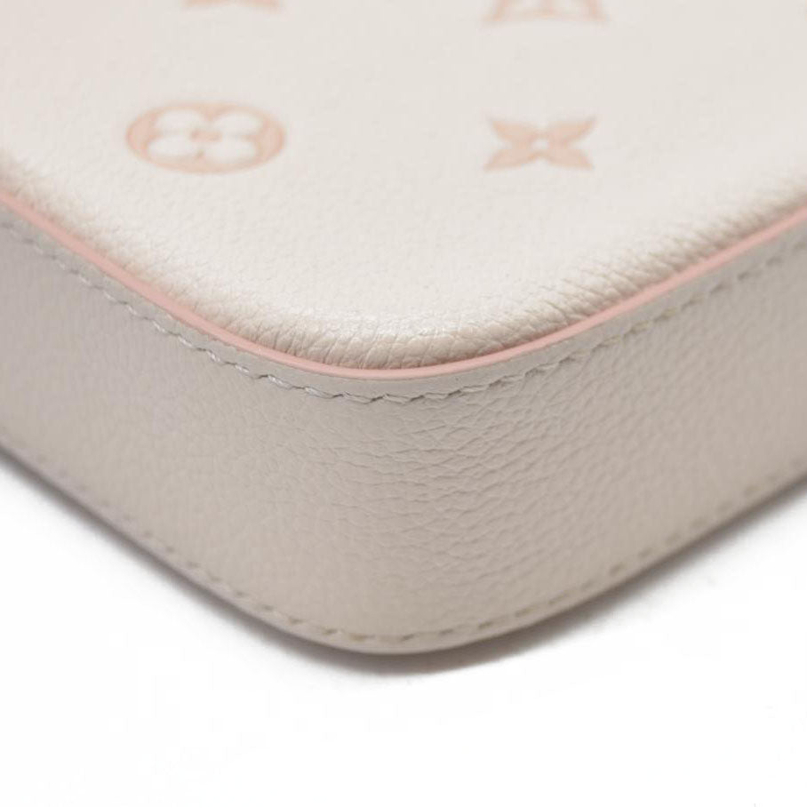 $1990 Louis Vuitton House's signature Monogram Pochette Félicie Bicolor Eden