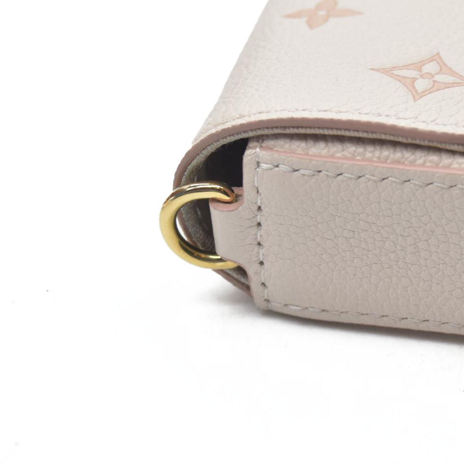 $1990 Louis Vuitton House's signature Monogram Pochette Félicie Bicolor Eden