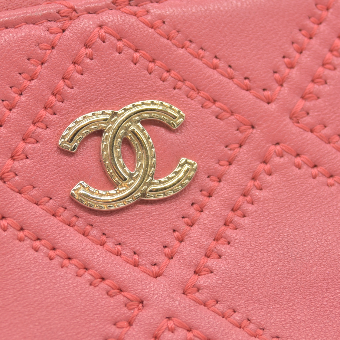 $950 2018 Coco Mark double stitched Matelassé fringed clutch bag by Chanel