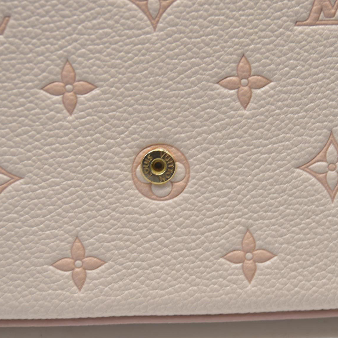 $1990 Louis Vuitton House's signature Monogram Pochette Félicie Bicolor Eden