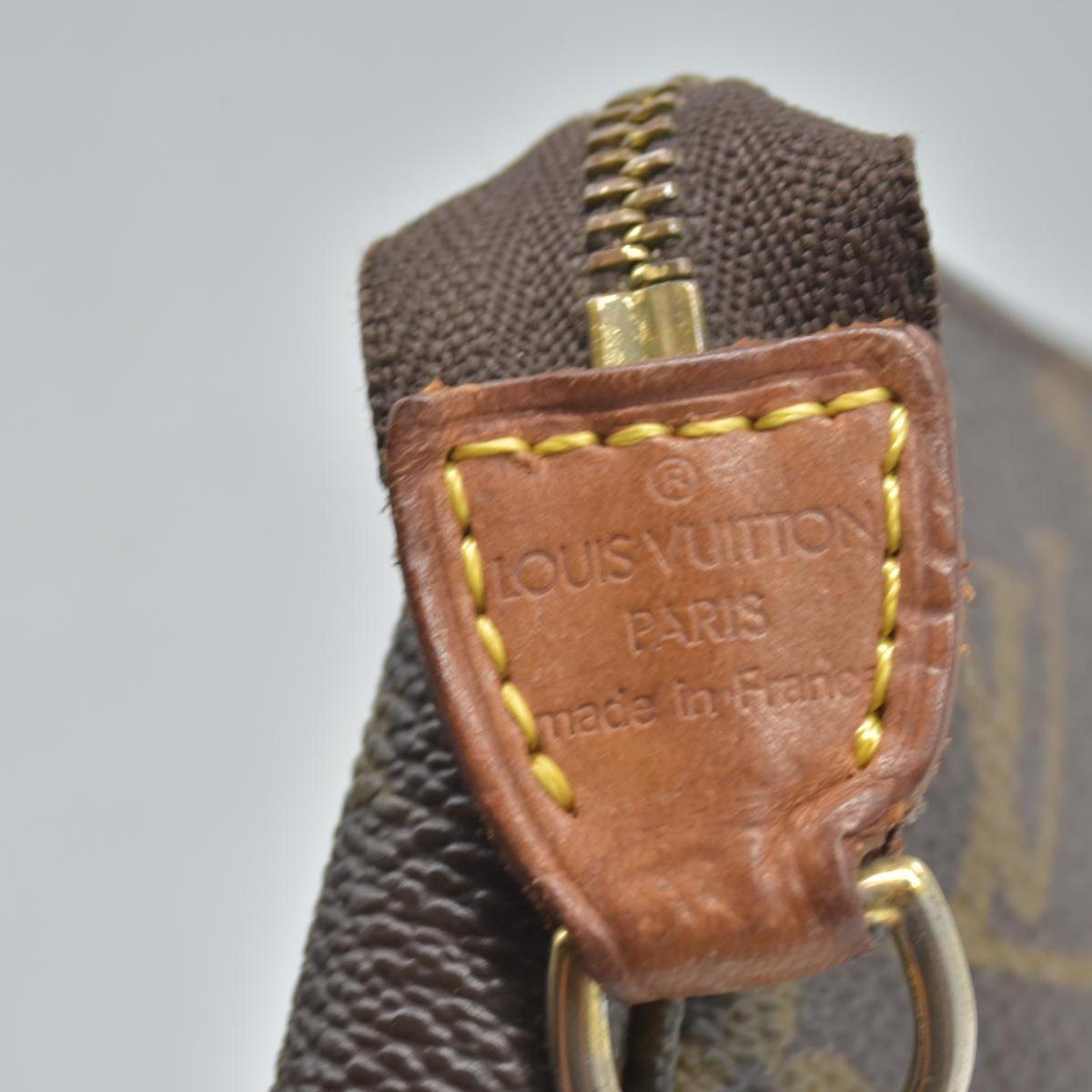 $1290 Louis Vuitton Monogram Pochette Accessories BJ0050
