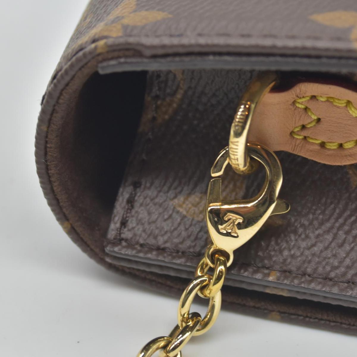 $1750 Louis Vuitton Monogram Wallet On Chain Lily