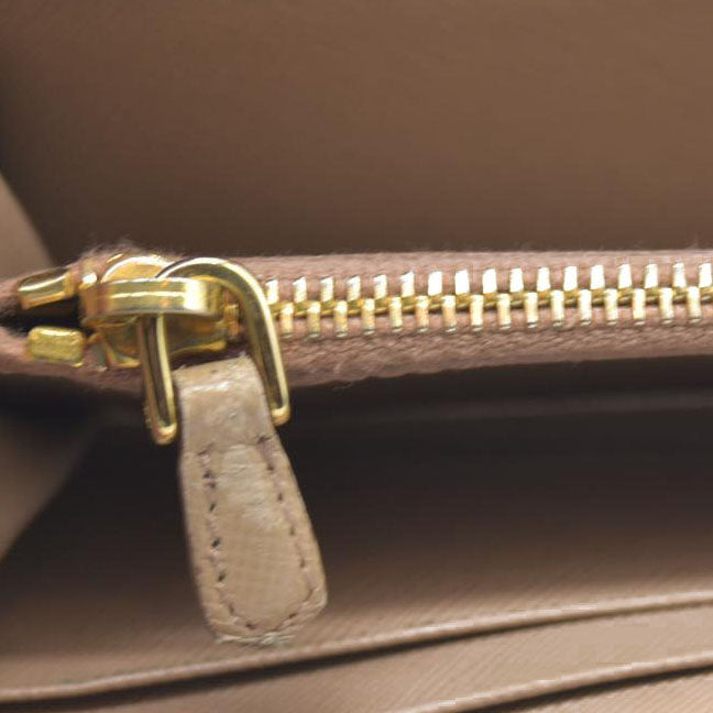 AUCTION $650 Prada  Saffiano Metal Zip Around Wallet Cammeo