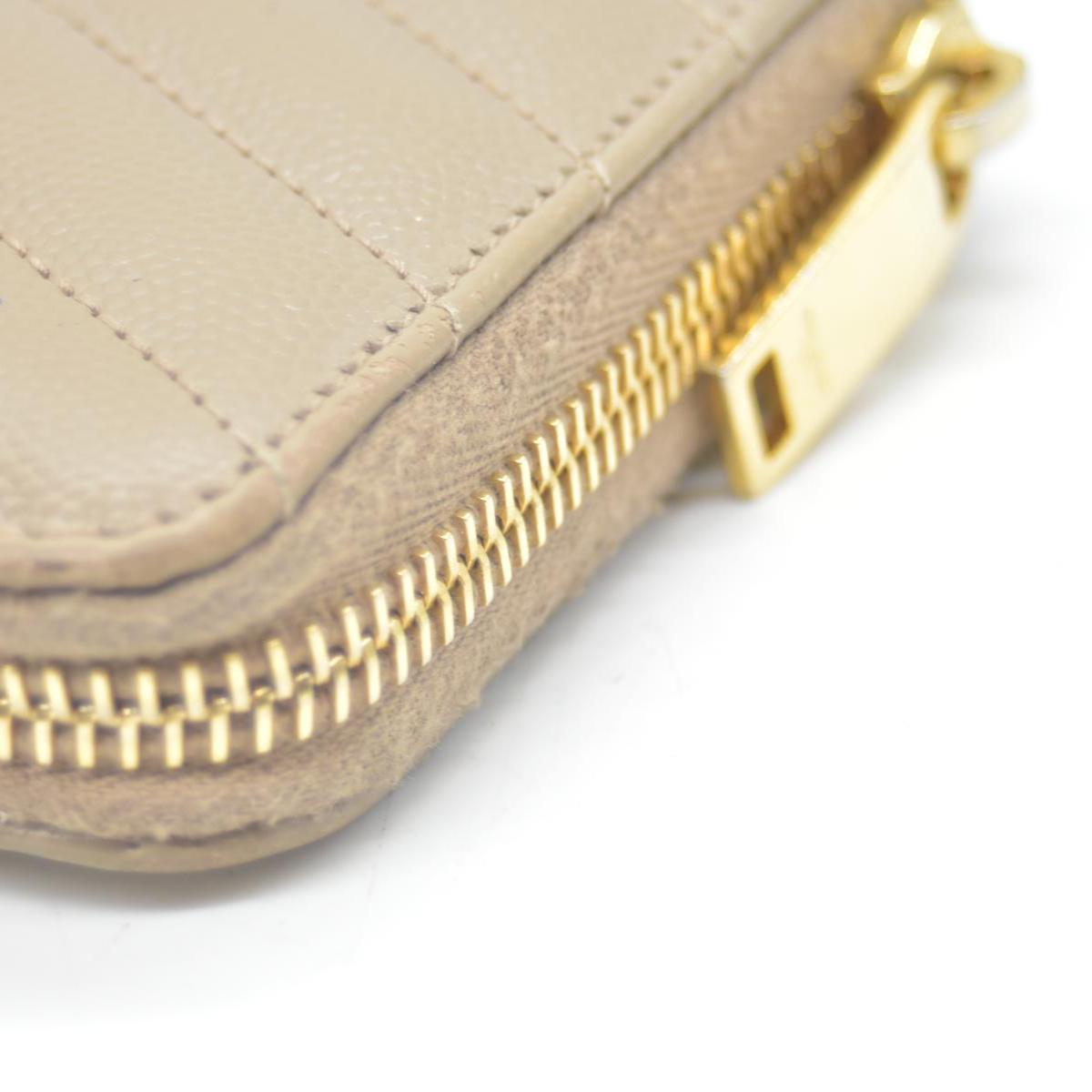 Saint Laurent Cassandre Matelassé Zip Around Wallet Beige CONSIGNMENT