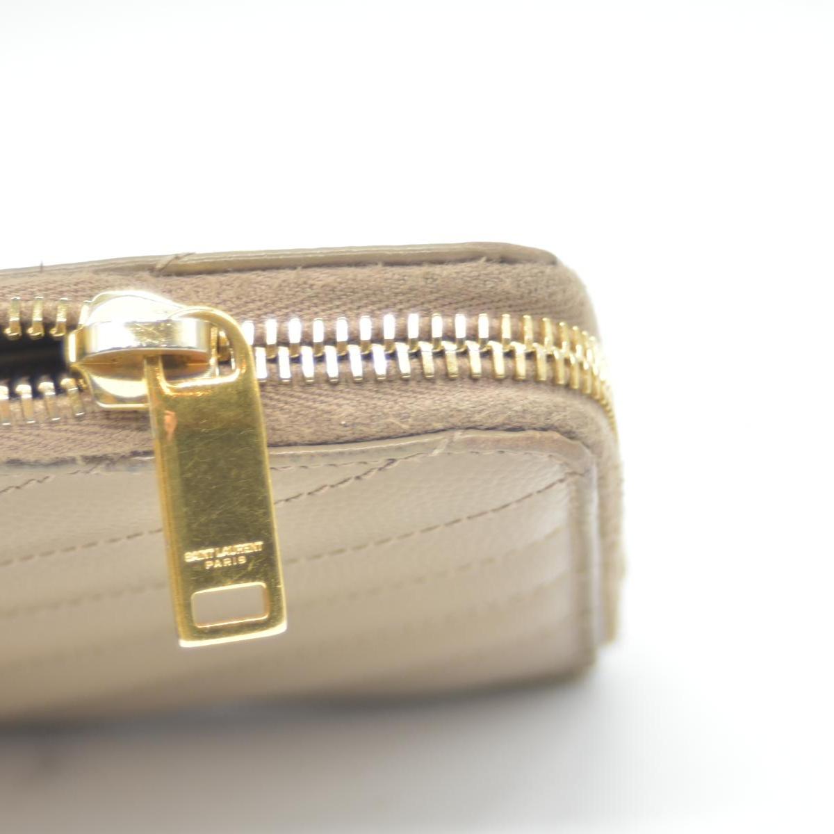 Saint Laurent Cassandre Matelassé Zip Around Wallet Beige CONSIGNMENT