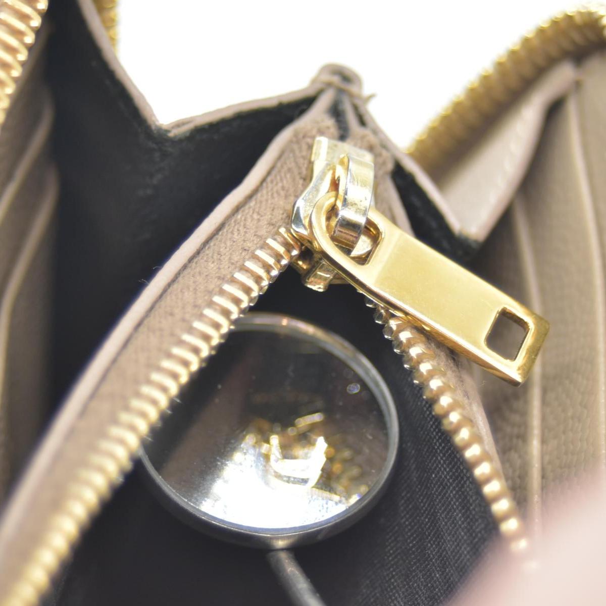 Saint Laurent Cassandre Matelassé Zip Around Wallet Beige CONSIGNMENT