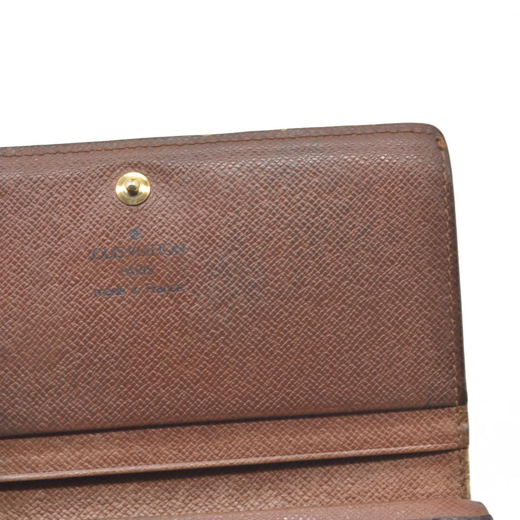 $560 Louis Vuitton  Monogram Porte-Monnaie Tresor Wallet