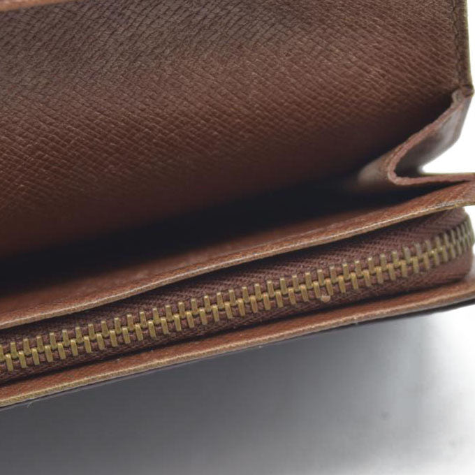 $560 Louis Vuitton  Monogram Porte-Monnaie Tresor Wallet