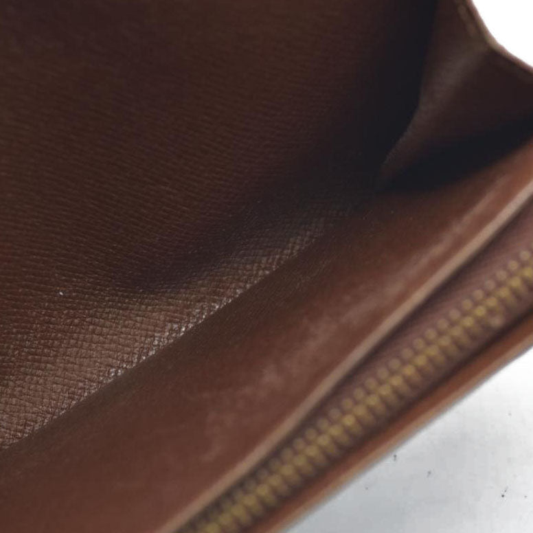 $560 Louis Vuitton  Monogram Porte-Monnaie Tresor Wallet